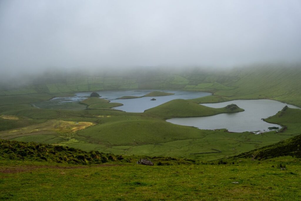 Corvo Caldeira on a foggy morning with lakes and pastures still visible