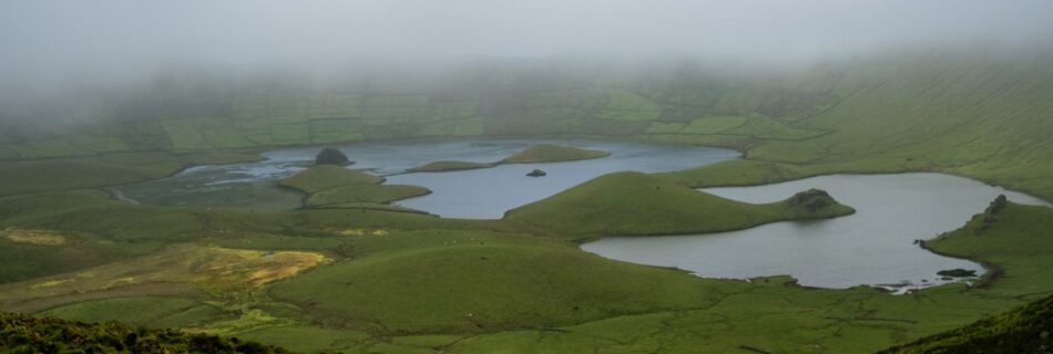 Corvo Caldeira on a foggy morning with lakes and pastures still visible