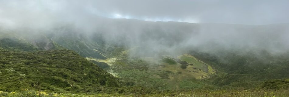 The Caldeira of Faial is covered in a light haze with the floor of the crater covered in plenty of green vegetation